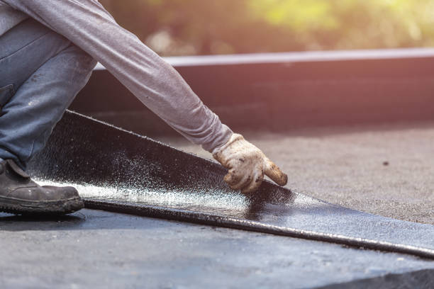 Professional Exterior Waterproofing technician working in Jenison, MI
